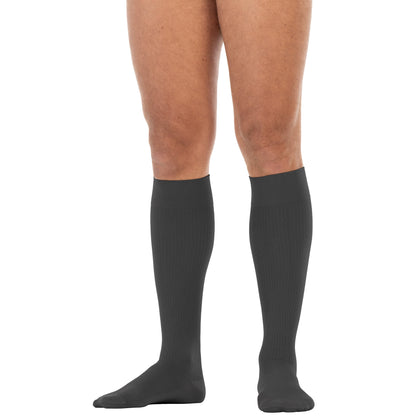 anthracite knee-high socks worn by a person on a white background