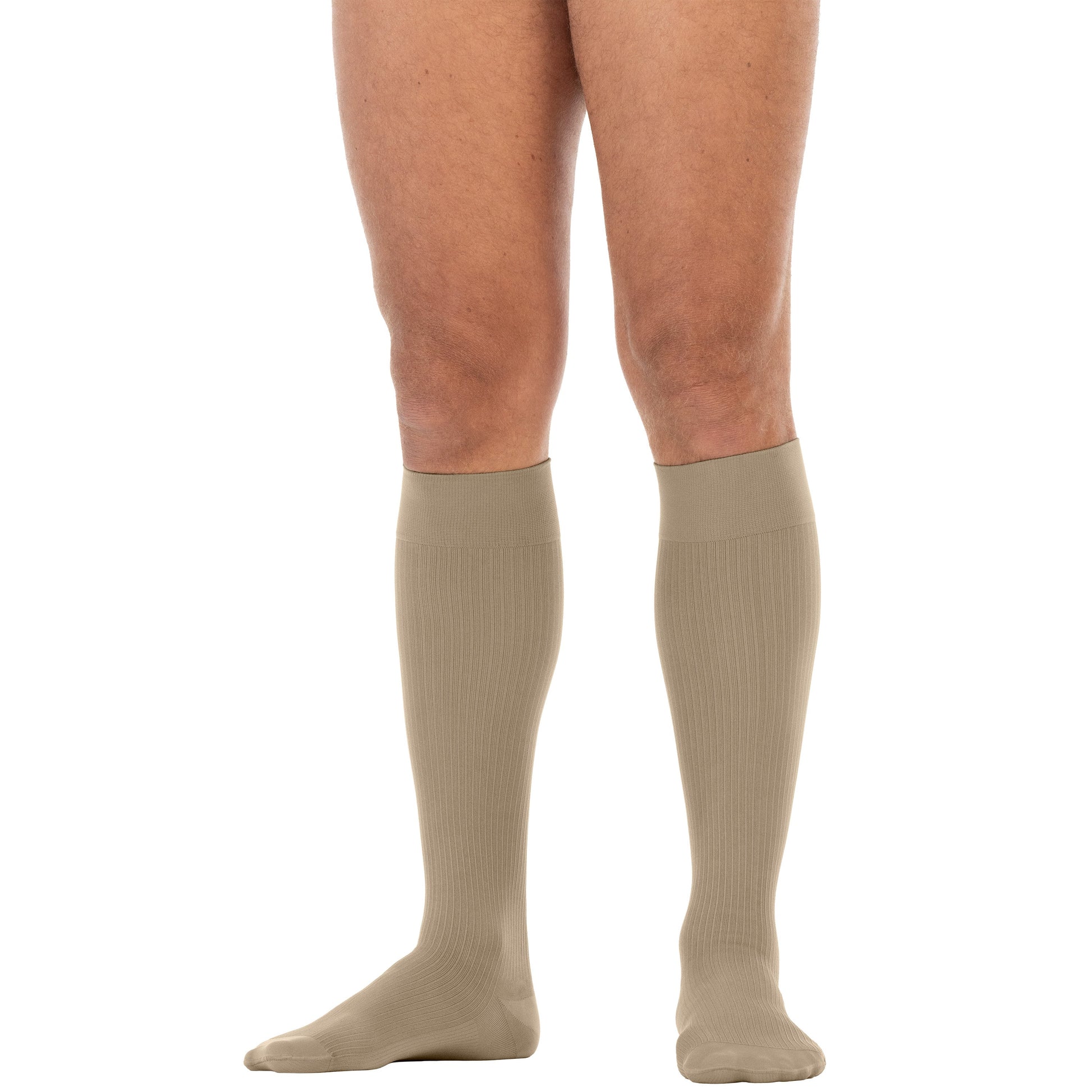 khaki knee-high socks worn by a person on a white background