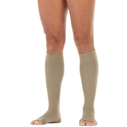 khaki knee-high socks worn by a person on a white background