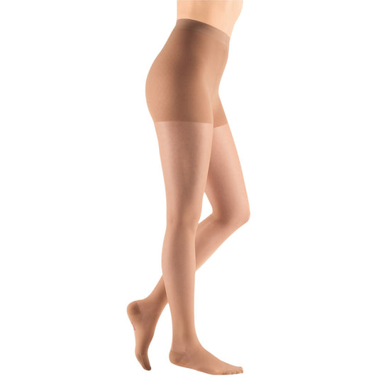 Compression Hosiery. Medical Compression stockings and tights for varicose  veins and venouse therapy. Socks for man and women. Clinical compression  knits. Comfort maternity tights for pregnant women Stock Photo by ©Med_Ved  550454006
